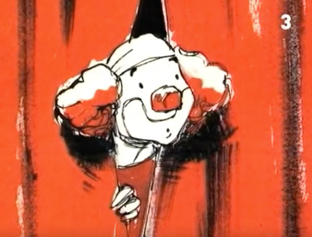 Le clown sort sa t&ecirc;te du rideau
